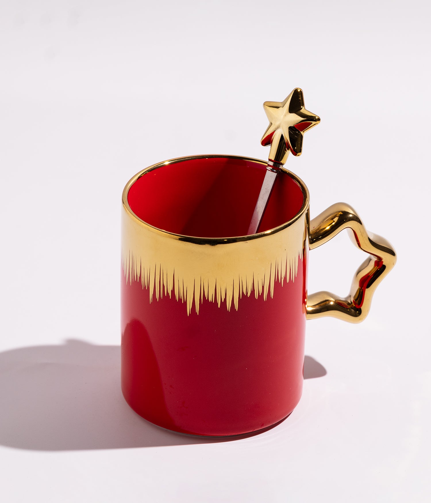 كوب سيراميك بخطوط ذهبيةمع ملعقة على شكل نجمة