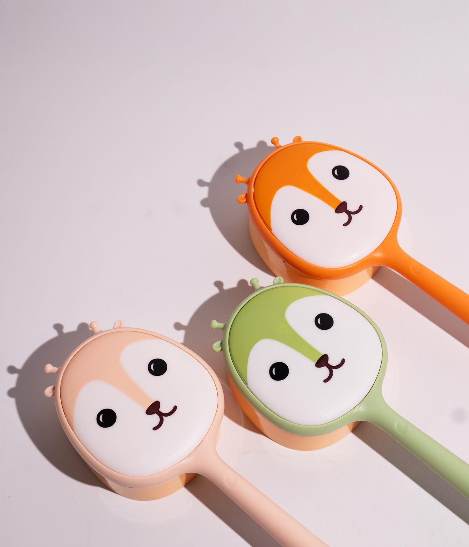 Exfoliating and body cleansing shower brush with long handle