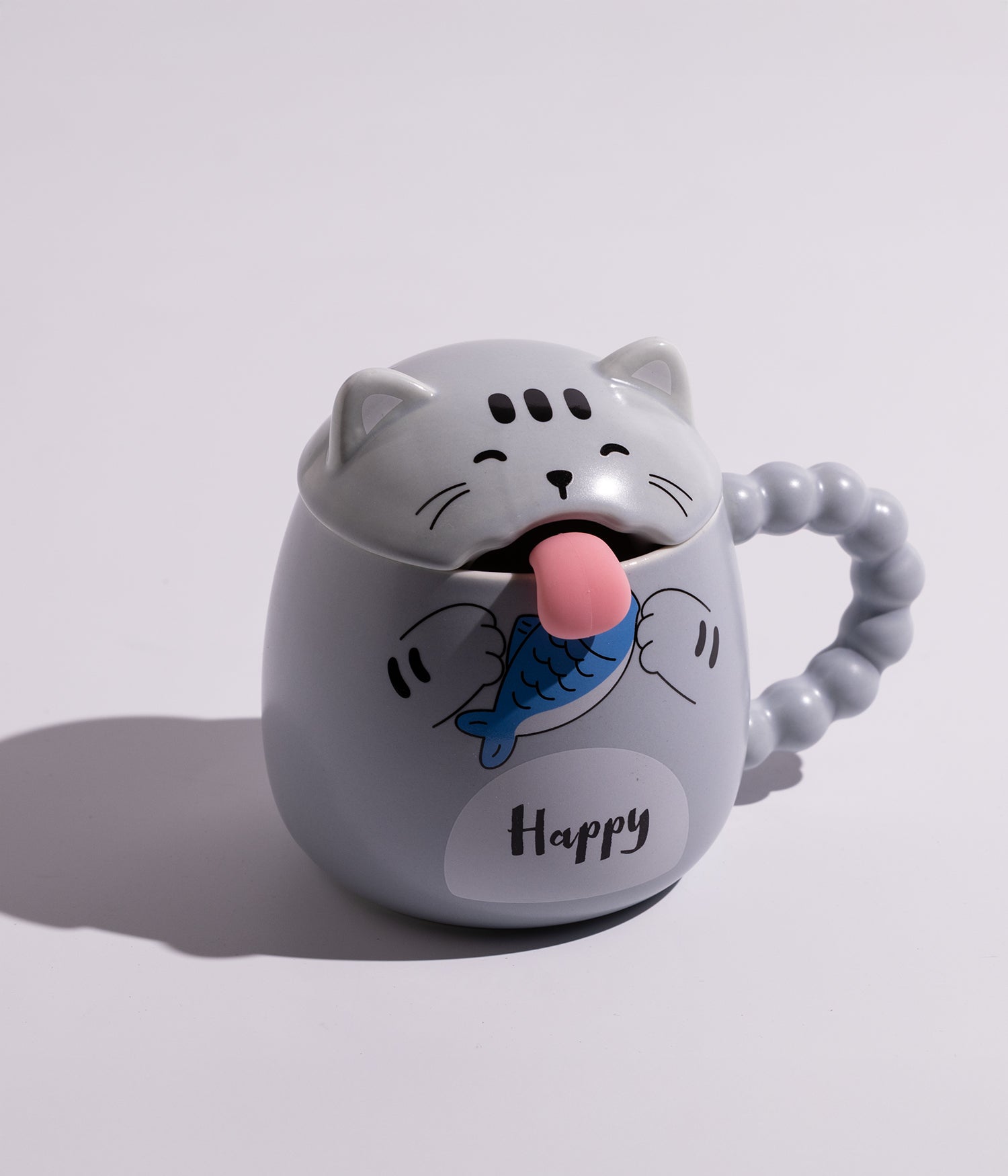 كوب بتصميم قطة مرحة مع غطاء وملعقة على شكل لسان القطة