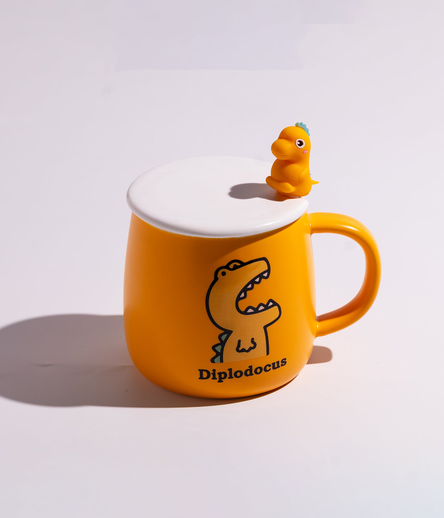 كوب سيراميك بتصميم ديناصورات وبغطاء وملعقة