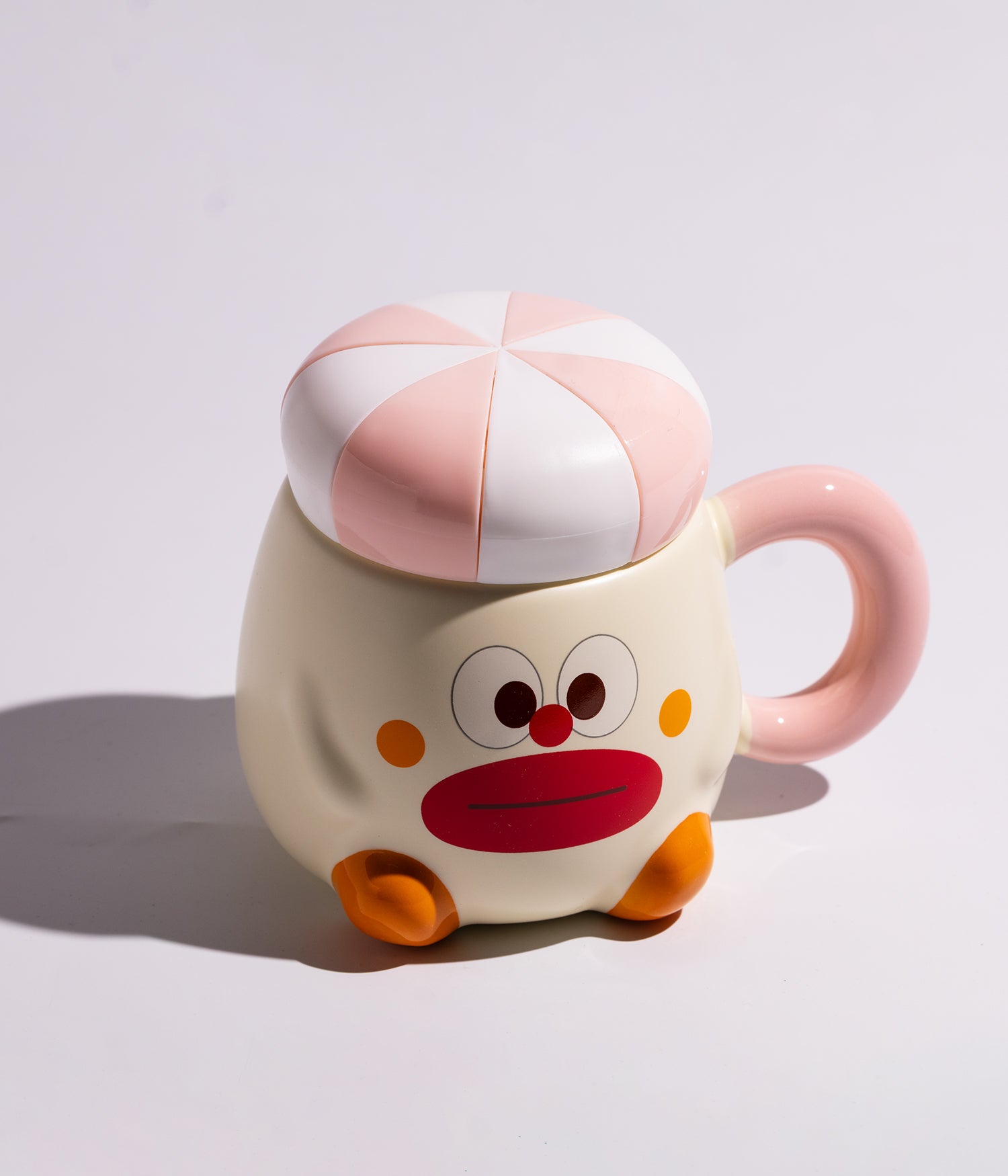 كوب سيراميك بتصميم المهرج المضحك مع غطاء مخطط لحفظ الحرارة وردي