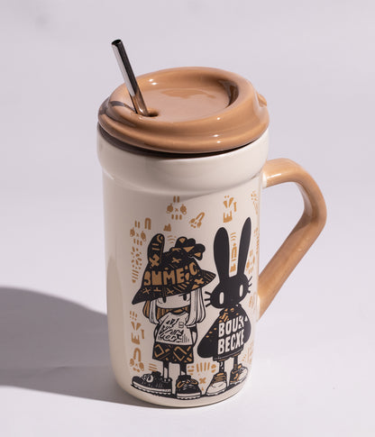 كوب سيراميك برسمة أرنبين مزوّد بغطاء ومزاز معدني عملي
