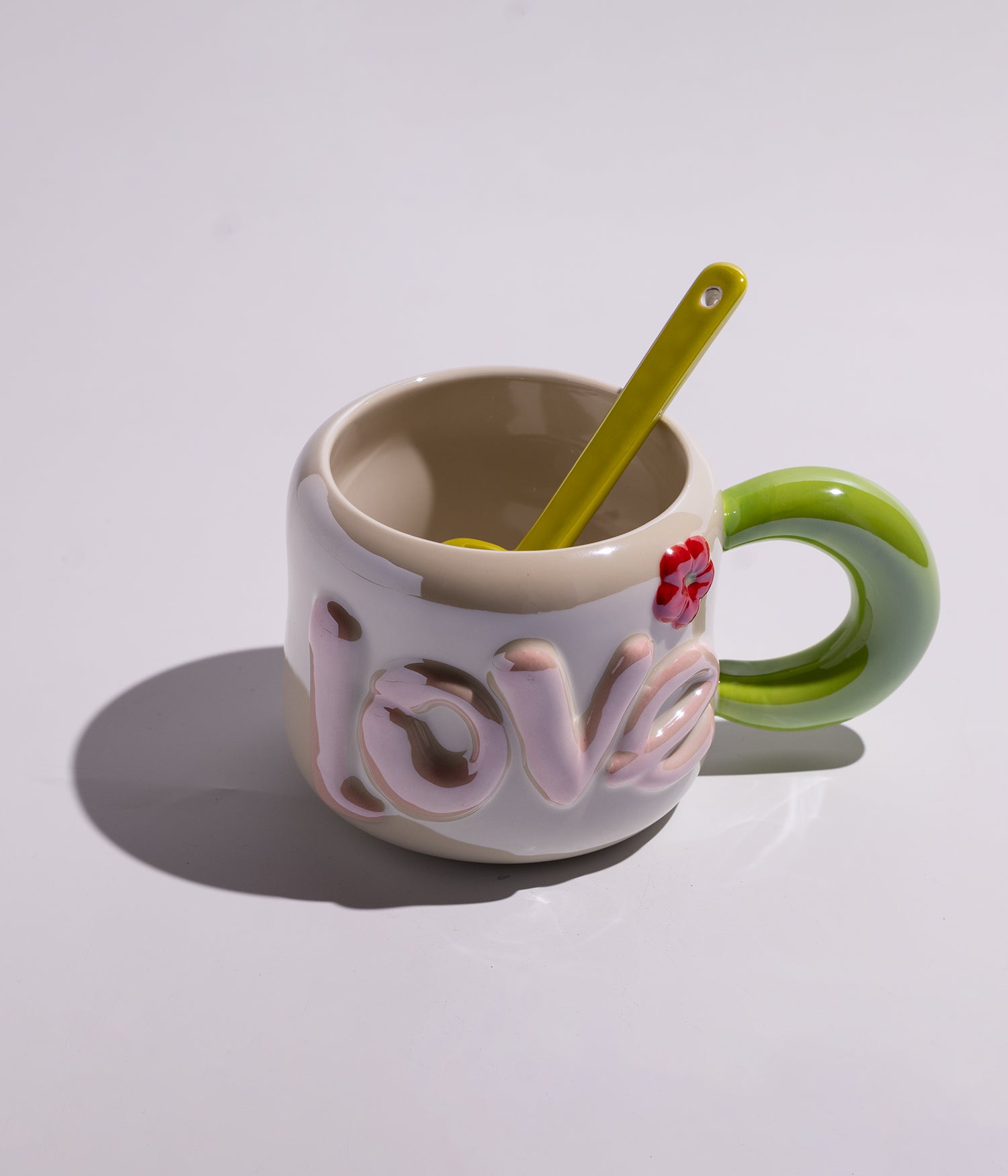 كوب قهوة سيراميك بعبارة LOVE  بالوان مبهجة مع ملعقة