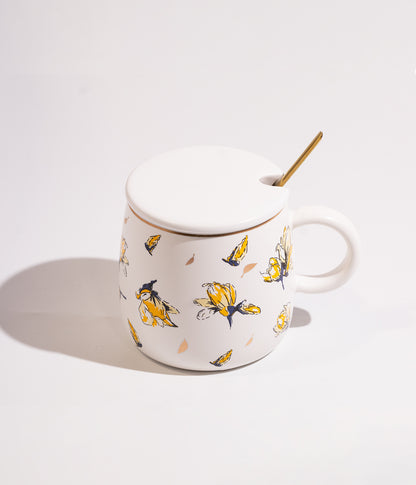 كوب سيراميك مزخرف بالورود الملونة مع ملعقة وغطاء لحفظ الحرارة