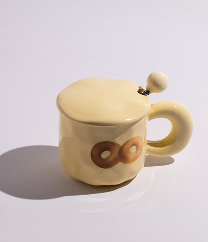 كوب سيراميك برسومات مختلفة مع غطاء وملعقة