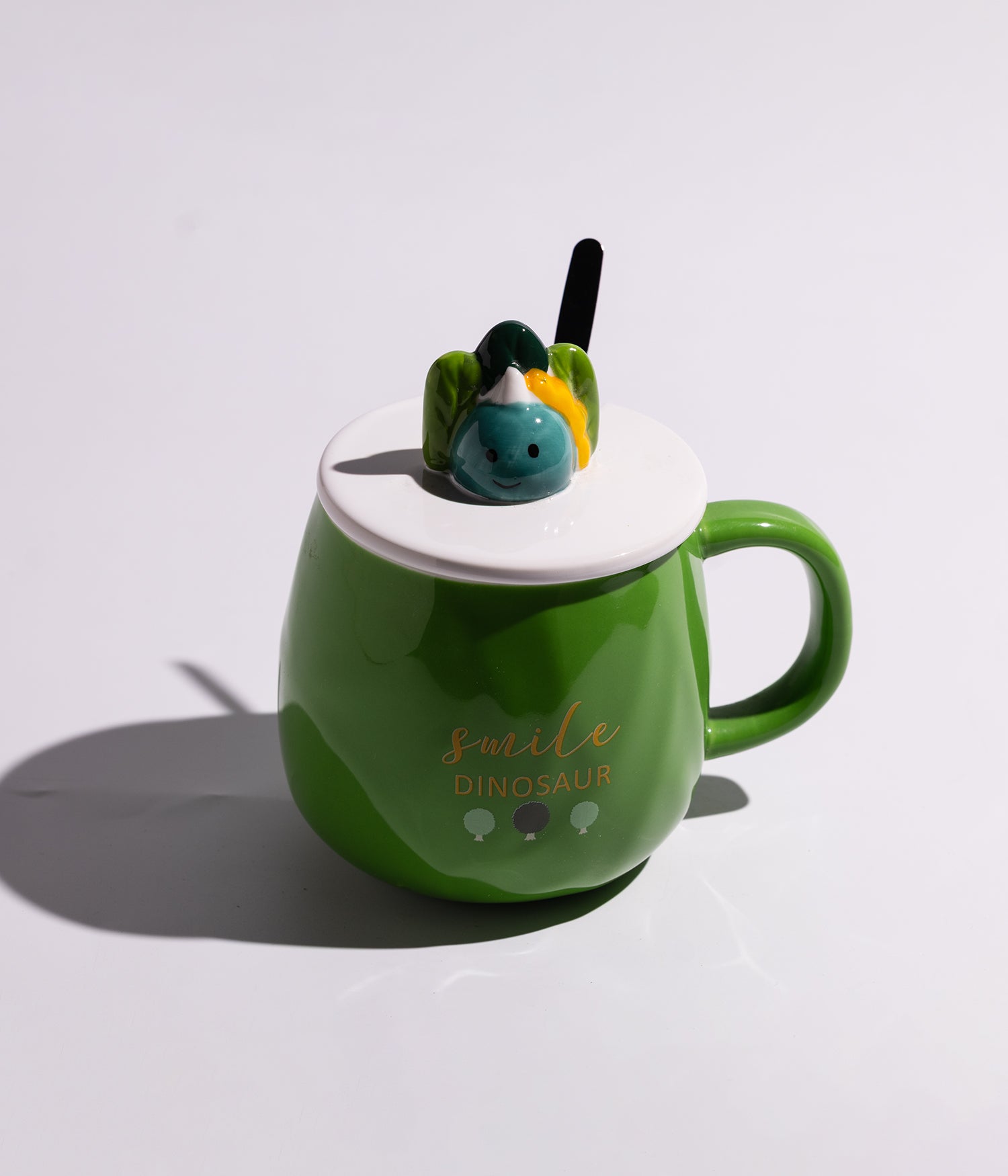 كوب سيراميك بعبارات لطيفة مزوّد بغطاء بمجسم ديناصور وملعقة