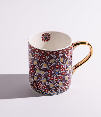 كوب سيراميك بنقوش هندسية شرقية ومقبض ذهبي أنيق