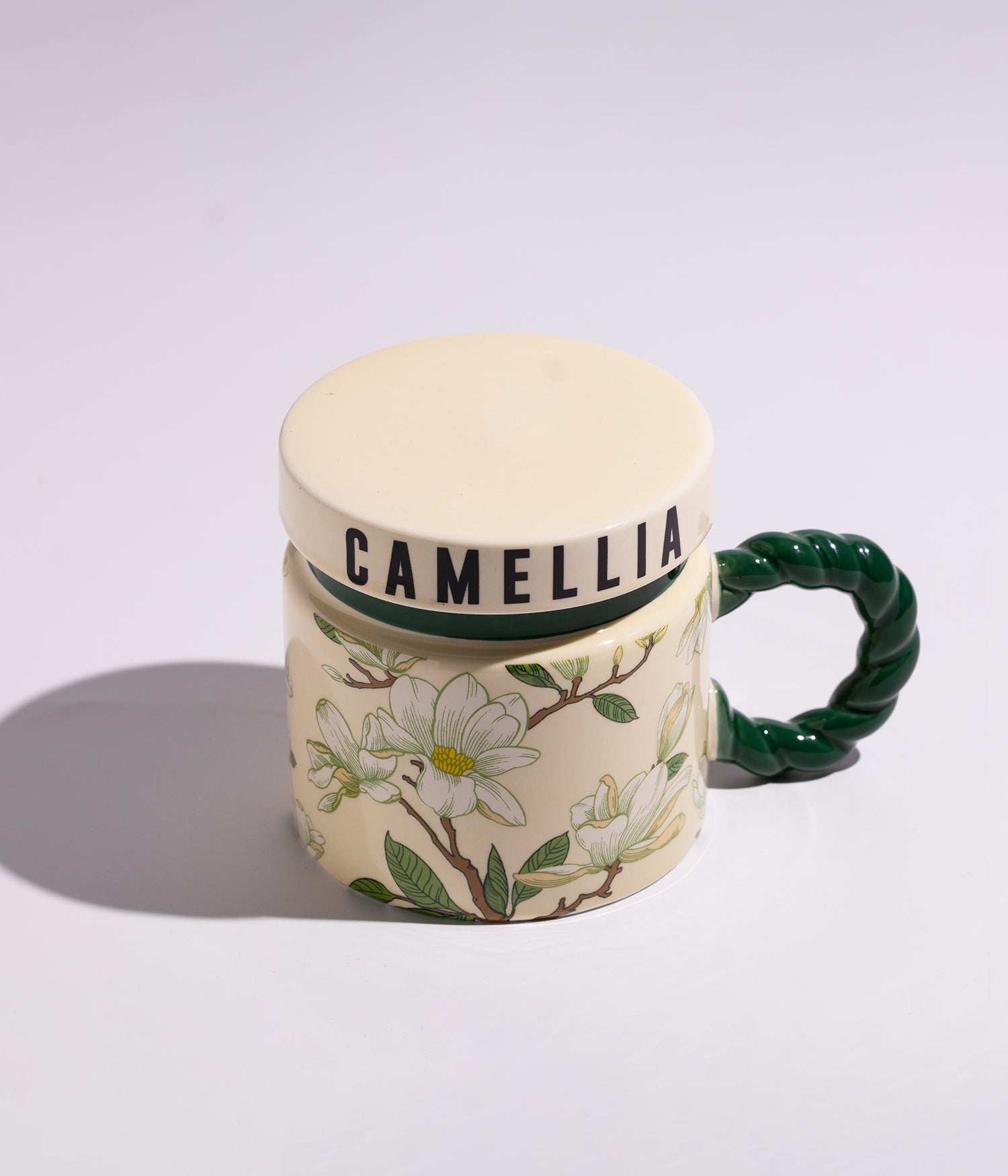 كوب سيراميك بتصميم ورود ملونة مع مقبض أخضر وغطاء محكم الاغلاق