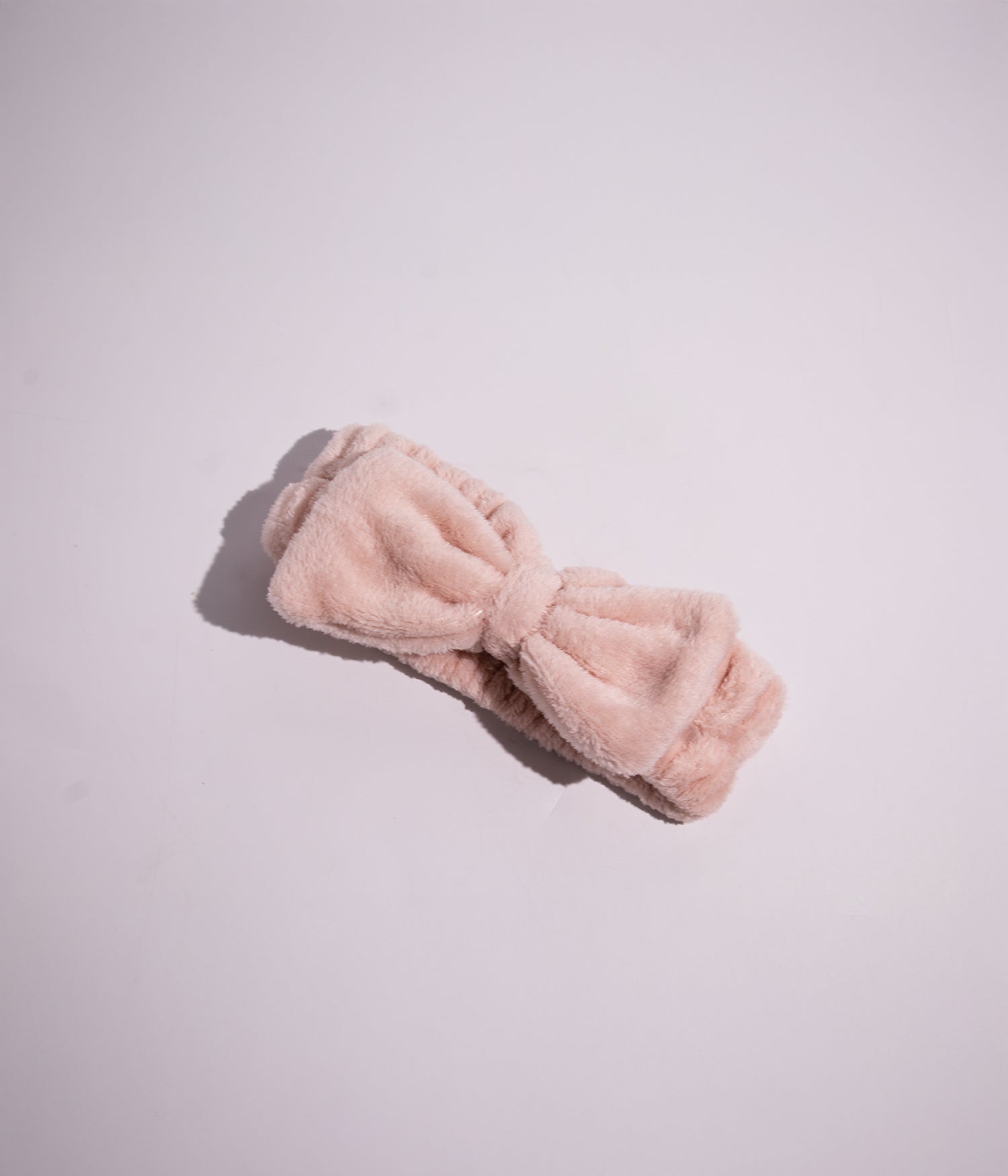 Soft hair tie to hold hair in place during skincare routine