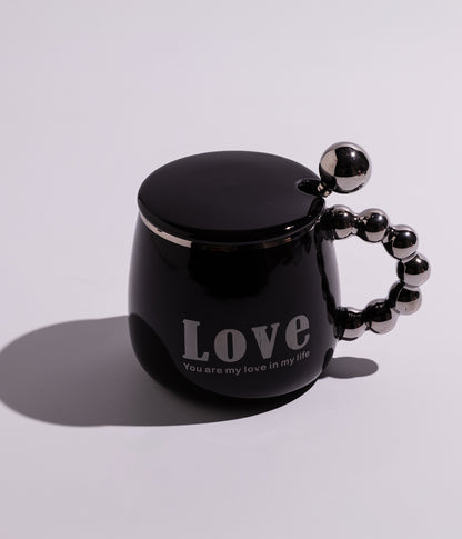 كوب قهوة سيراميك بعبارة LOVE بغطاء وملعقة ومقبض ميتاليك