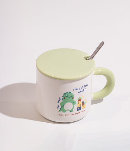 كوب قهوة سيراميك ابيض بتصميم ديناصور مرح مزود بغطاء اخضر وملعقة