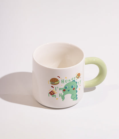 كوب قهوة سيراميك ابيض بتصميم ديناصور مرح مزود بغطاء اخضر وملعقة
