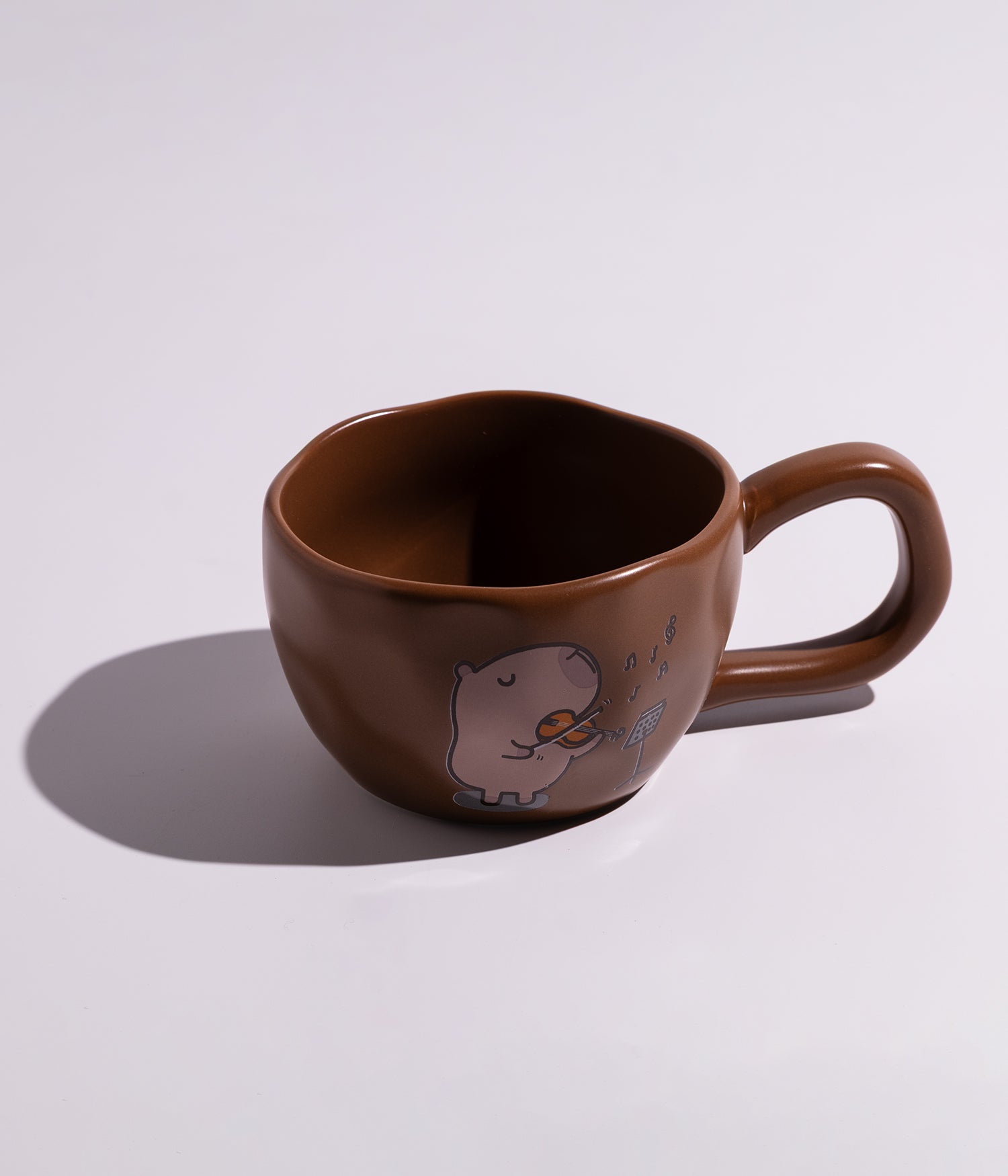 كوب سيراميك برسمة كلب البحر الموسيقي وبمقبض مريح