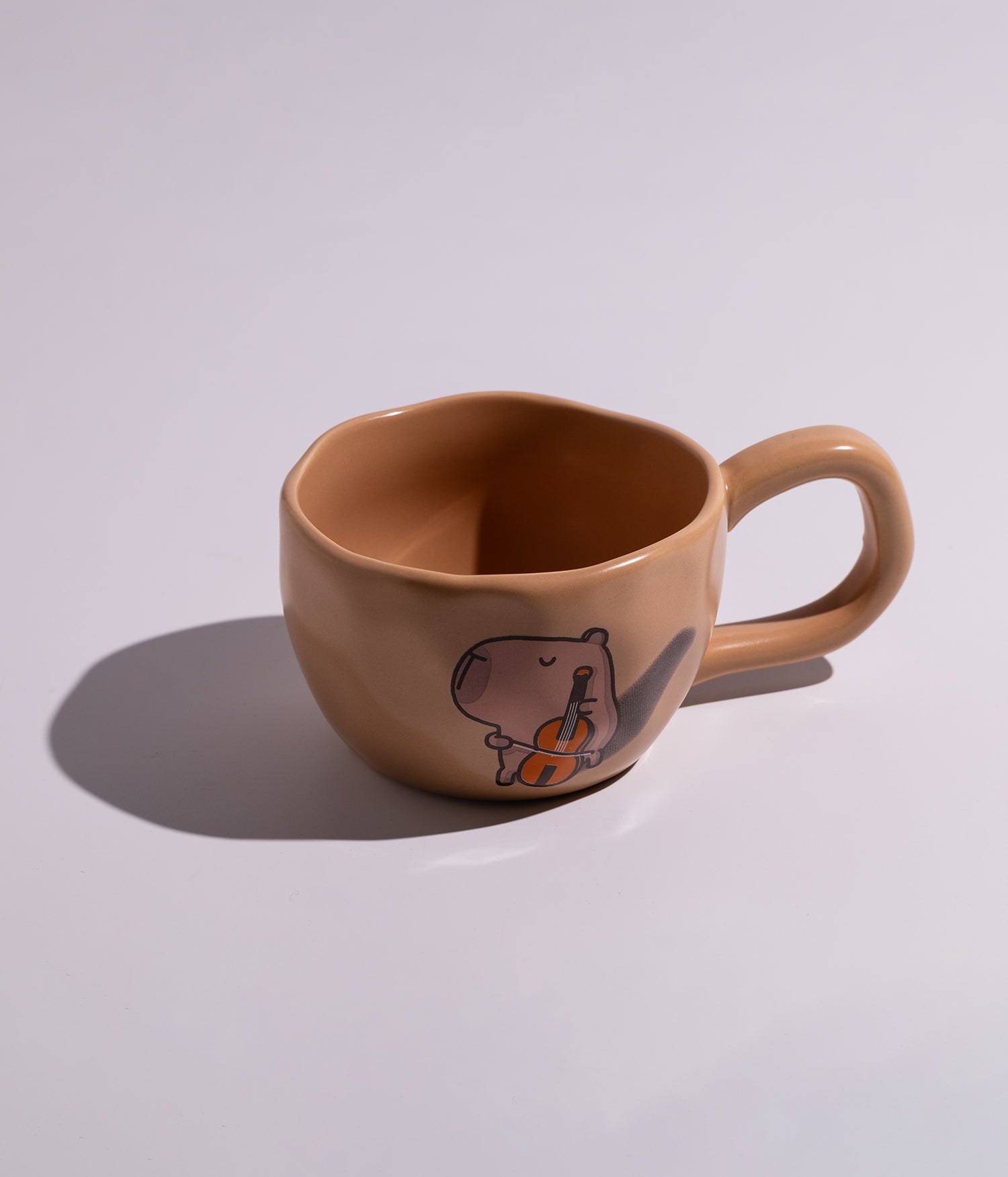 كوب سيراميك برسمة كلب البحر الموسيقي وبمقبض مريح