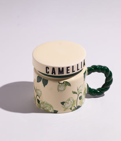 كوب سيراميك بتصميم ورود ملونة مع مقبض أخضر وغطاء محكم الاغلاق