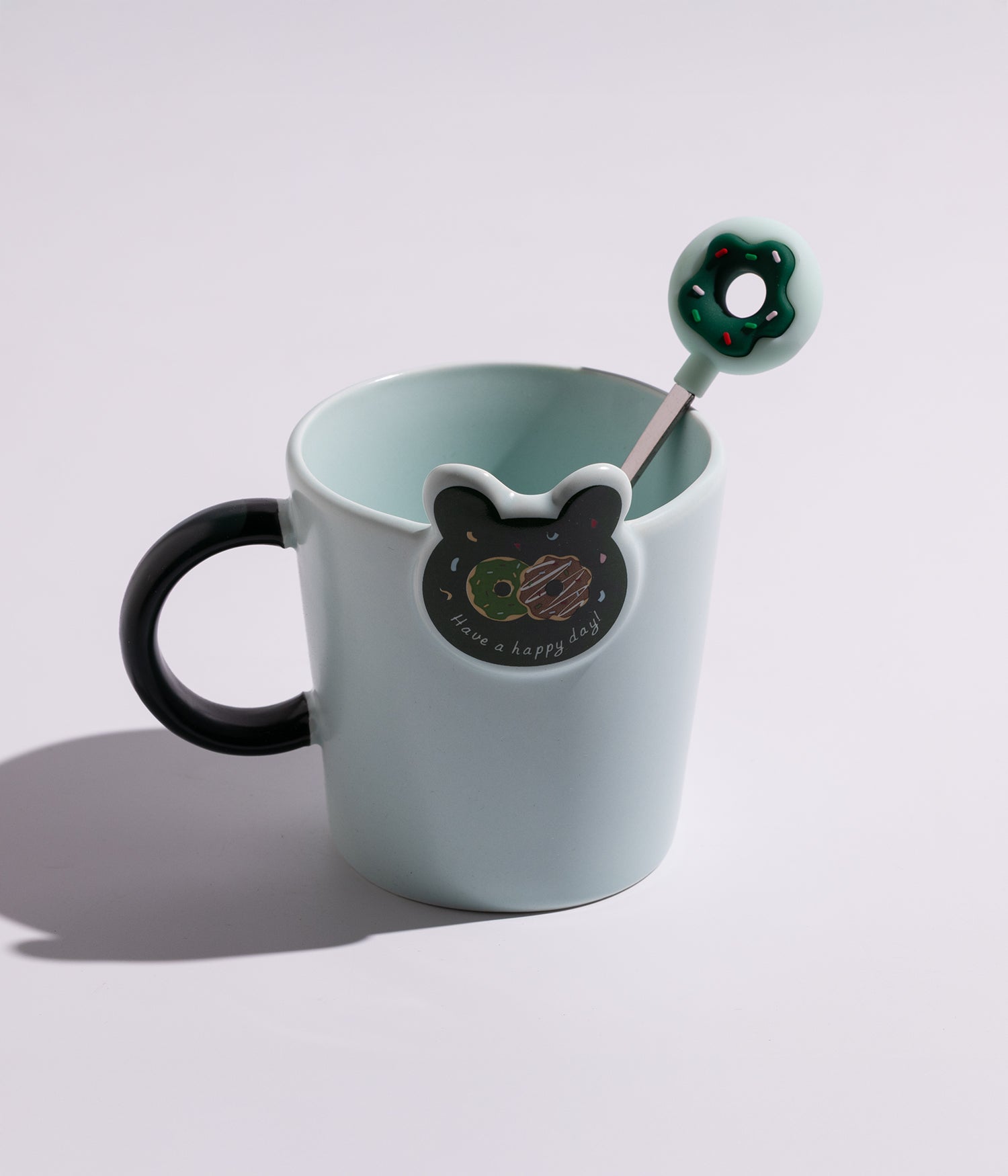 كوب سيراميك بمجسم أرنب مزوّد بملعقة على شكل دونات