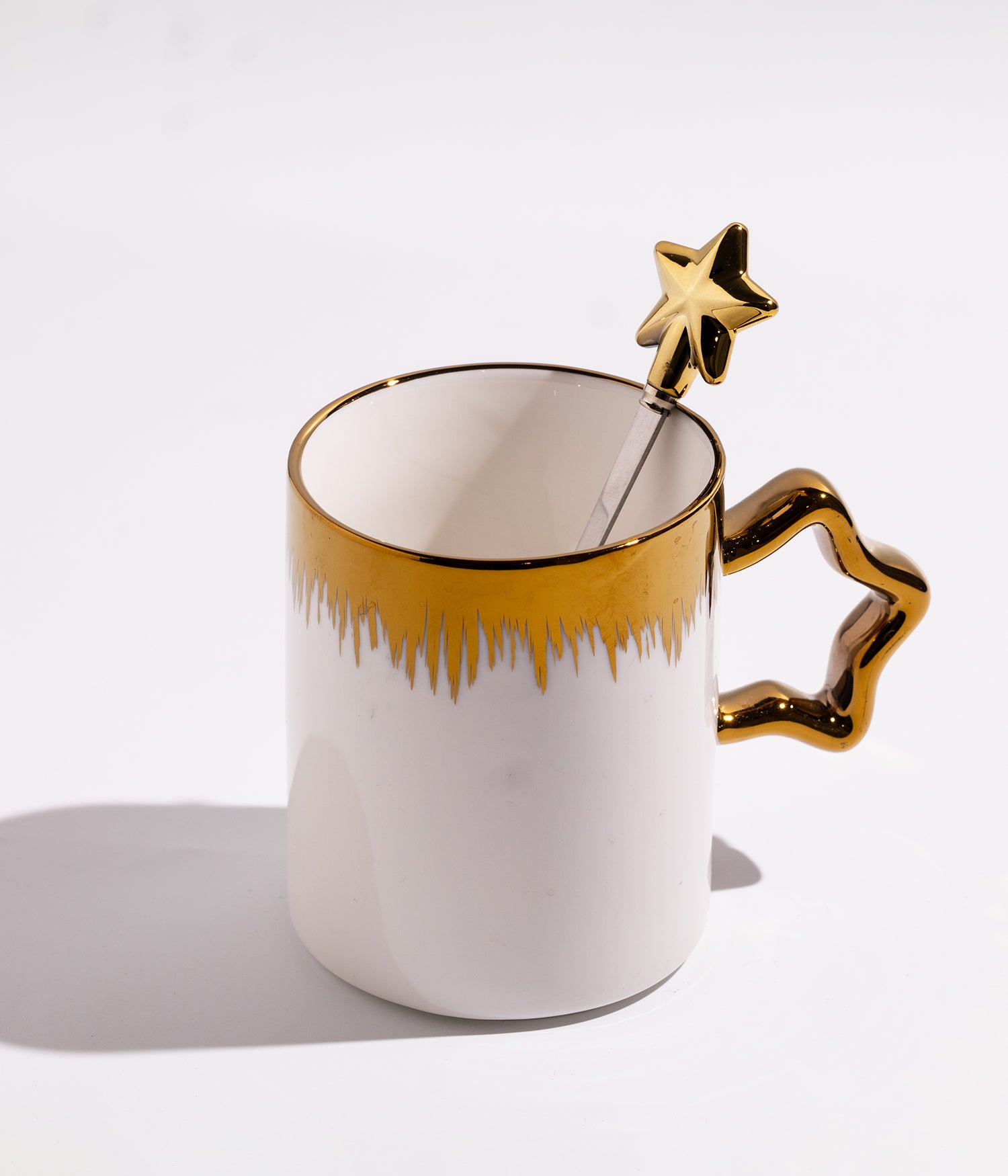 كوب سيراميك بخطوط ذهبيةمع ملعقة على شكل نجمة