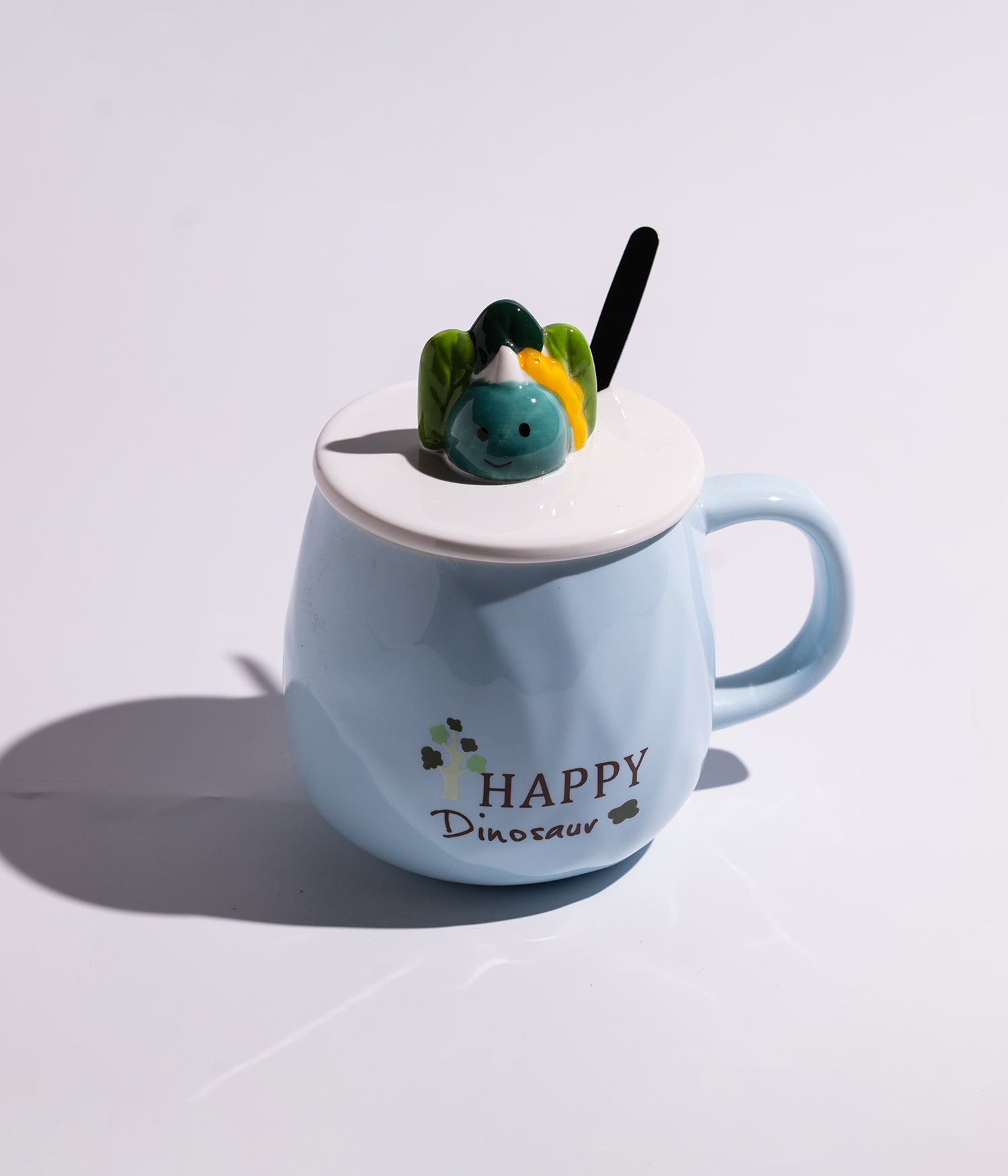 كوب سيراميك بعبارات لطيفة مزوّد بغطاء بمجسم ديناصور وملعقة