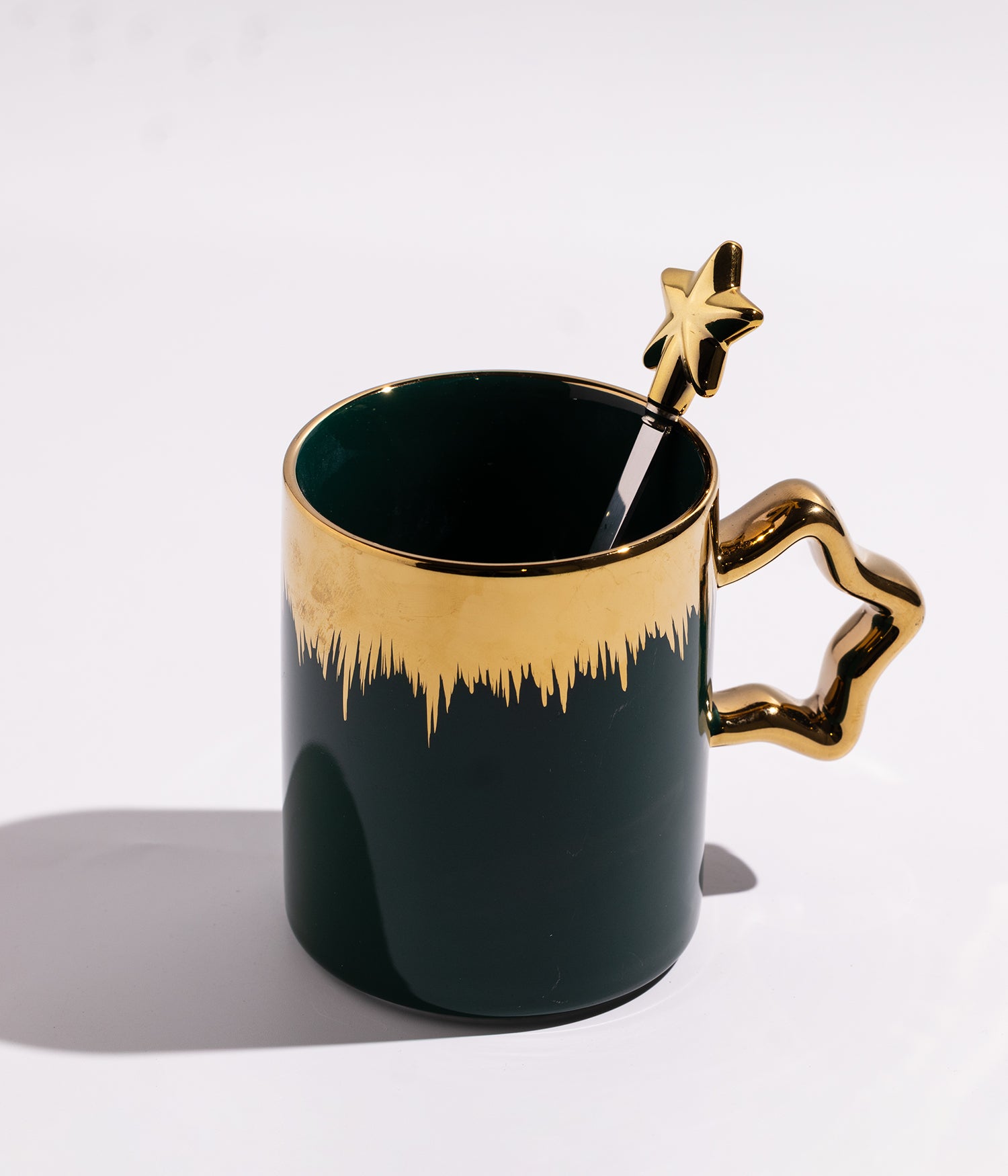 كوب سيراميك بخطوط ذهبيةمع ملعقة على شكل نجمة