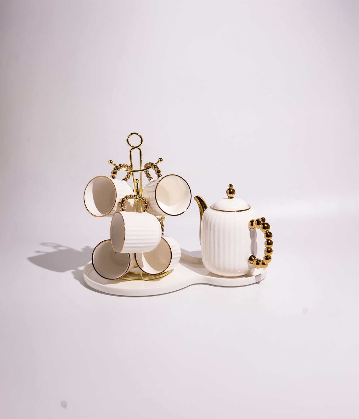 طقم شاي أبريق وأكواب سيراميك مع صحن بتصميم لؤلؤي ذهبي – 9 قطع
