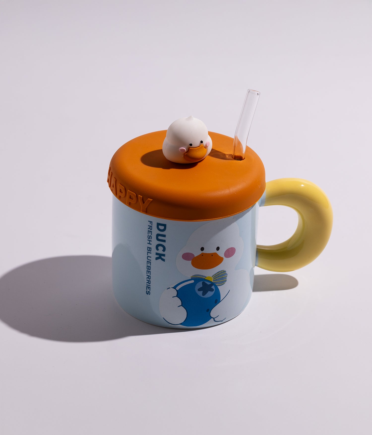 كوب سيراميك بتصميم بطوط وقطع فواكه مع غطاء على شكل بطوط ومزاز لون أزرق بغطاء برتقالي