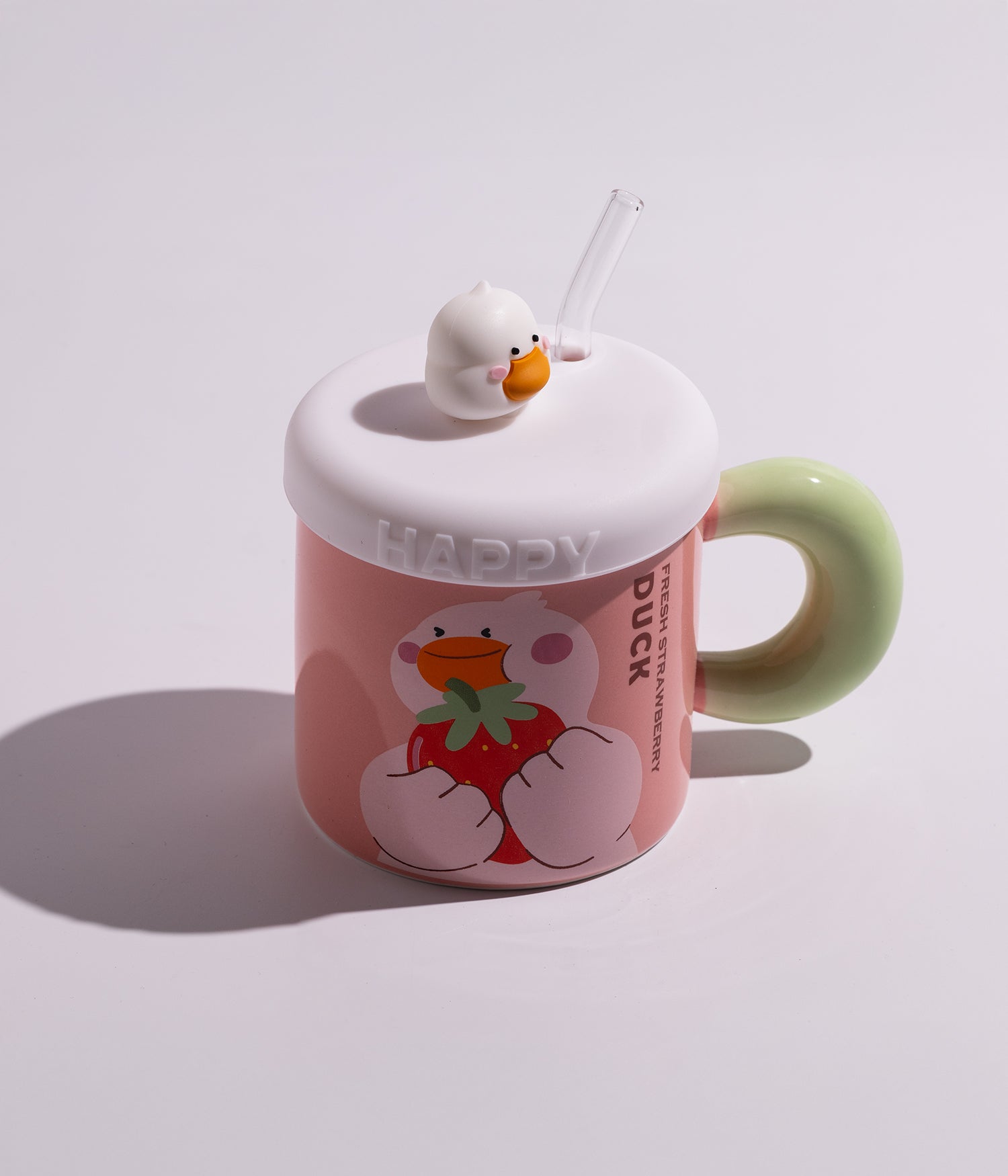 كوب سيراميك بتصميم بطوط وقطع فواكه مع غطاء على شكل بطوط ومزاز لون وردي بغطاء أبيض