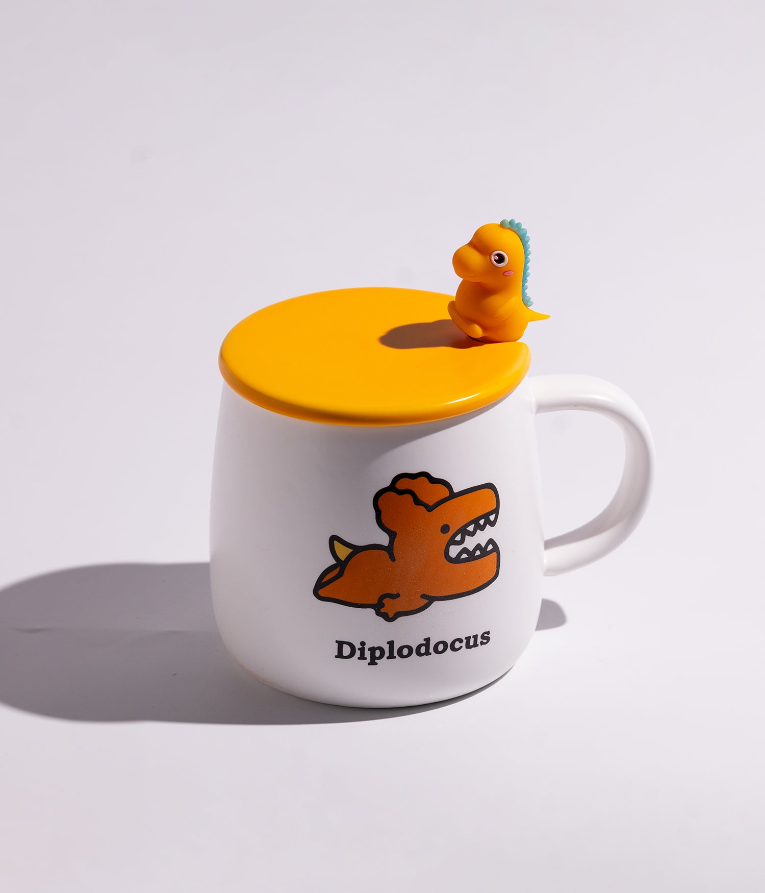 كوب سيراميك بتصميم ديناصورات وبغطاء وملعقة