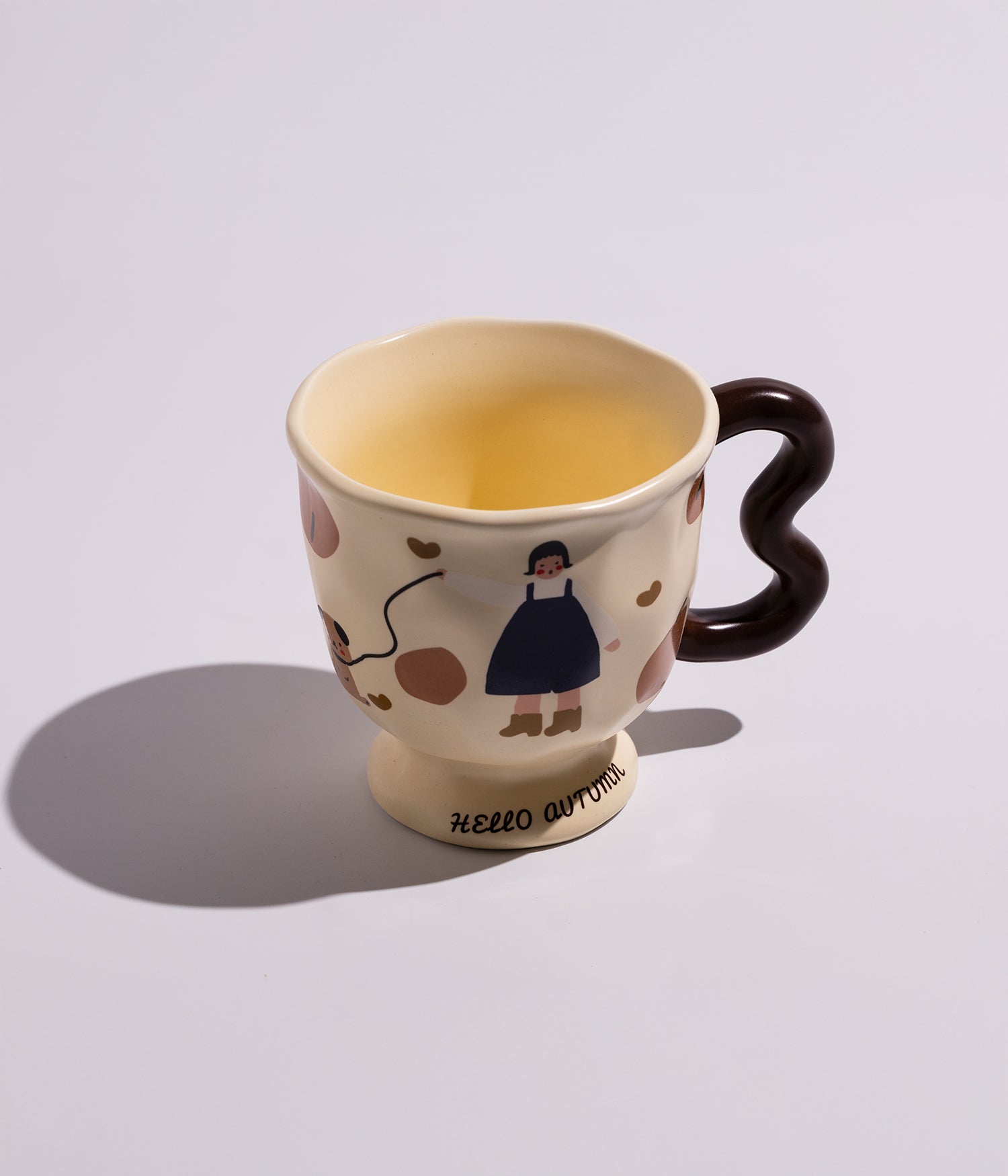 cream-ceramic-mug-cartoon-design-with-wavy-handle